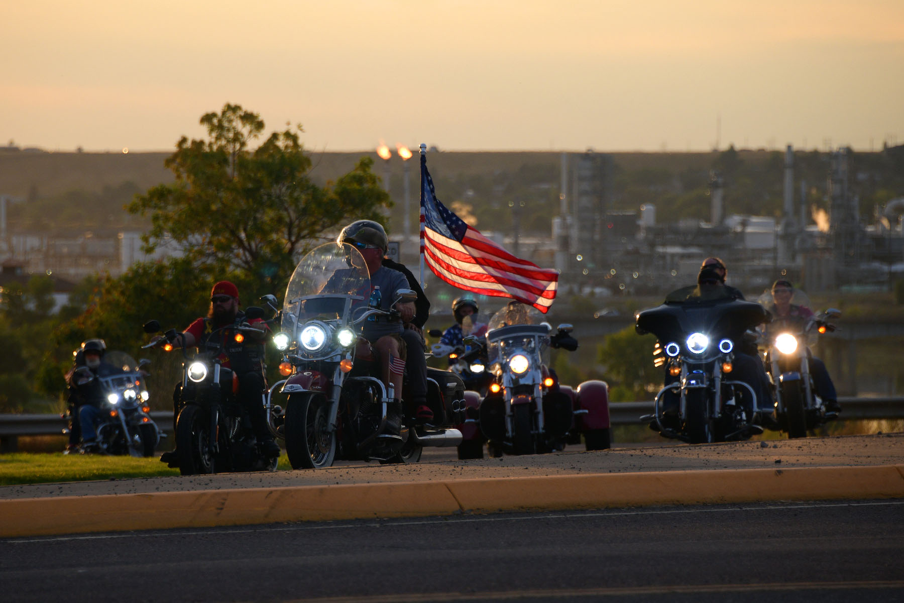 Motorcycles turn onto 25th Street North from River Drive North on their way to the Montana Veterans Memorial during the 9/11 Memorial Ride in Great Falls, Montana on September 11, 2023. Photograph by Eric Peterson.