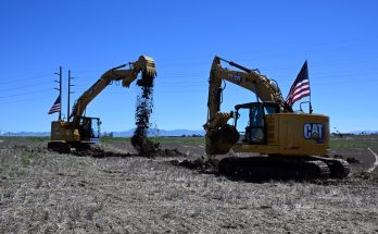 To conclude the Janicki Industries Montana groundbreaking ceremony, John and Peter Janicki operated excavators to move the first shovels of dirt at the construction site located at AgriTech Park in Great Falls, Montana on July 10, 2026. Photo credit Eric Peterson